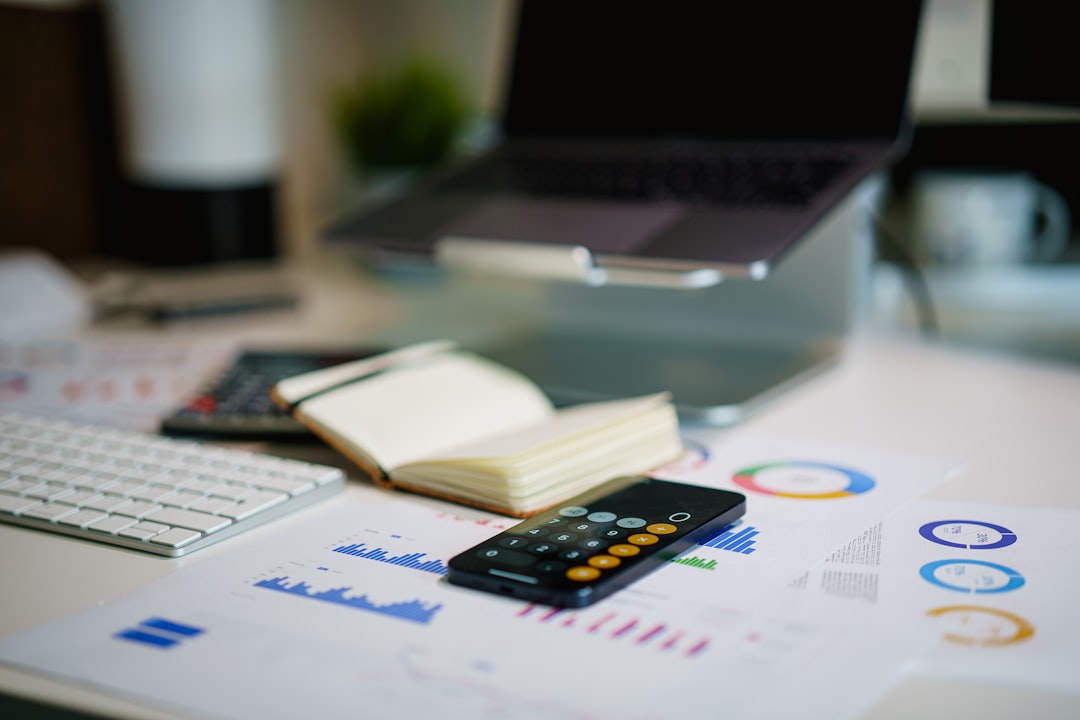 Comparison of top bookkeeping software for freelancers in 2026 with laptop and receipts